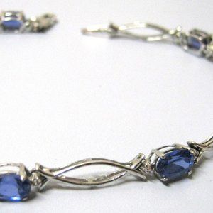 Genuine Silver and Topaz Tennis Bracelet